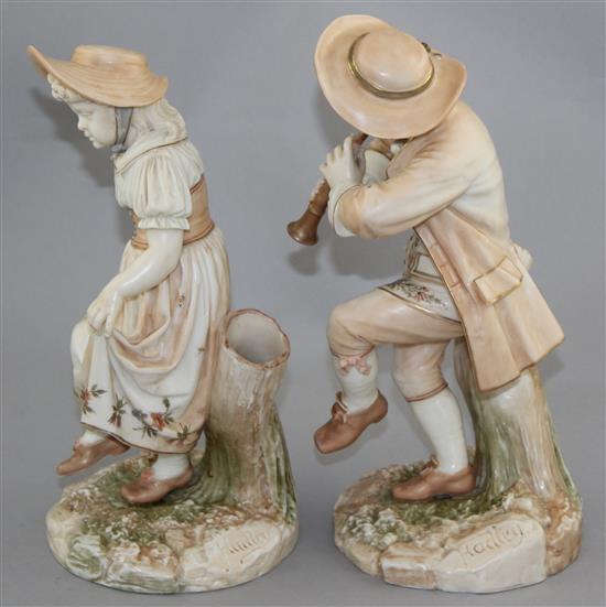 A pair of Royal Worcester blush ivory figures of Kate Greenway style children, modelled by James Hadley, 25.5cm and 24.5cm